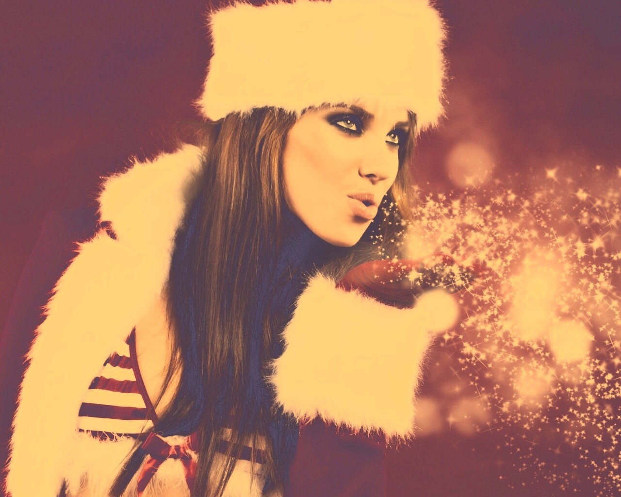 Снегурочка дует на снежинки обои