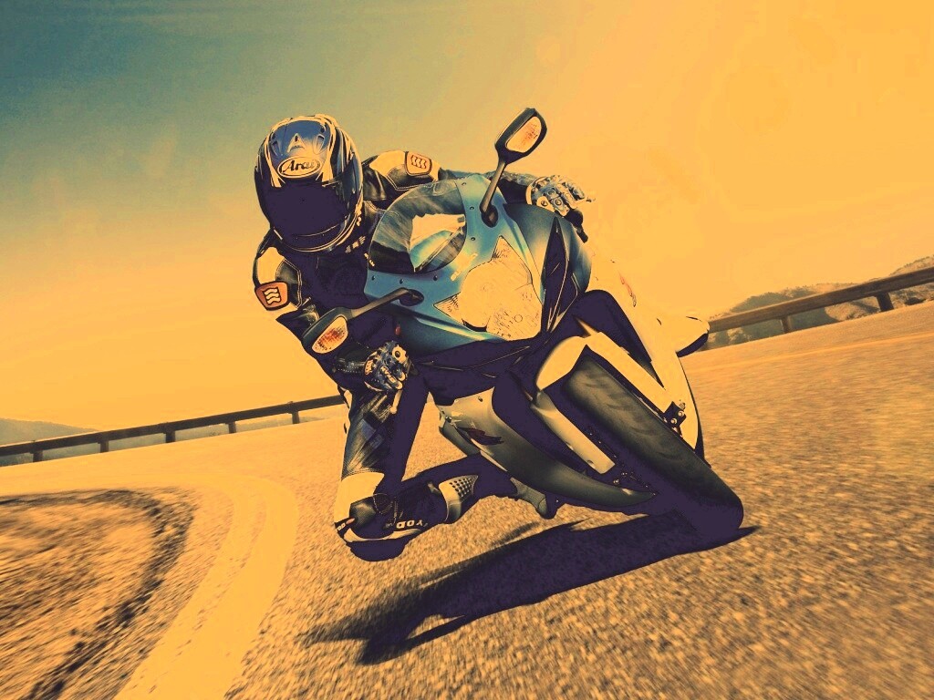 Мотоциклист на повороте обои