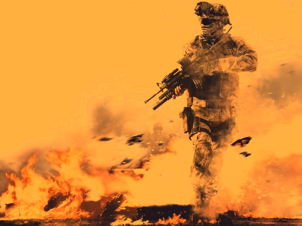 Солдат на фоне огня обои