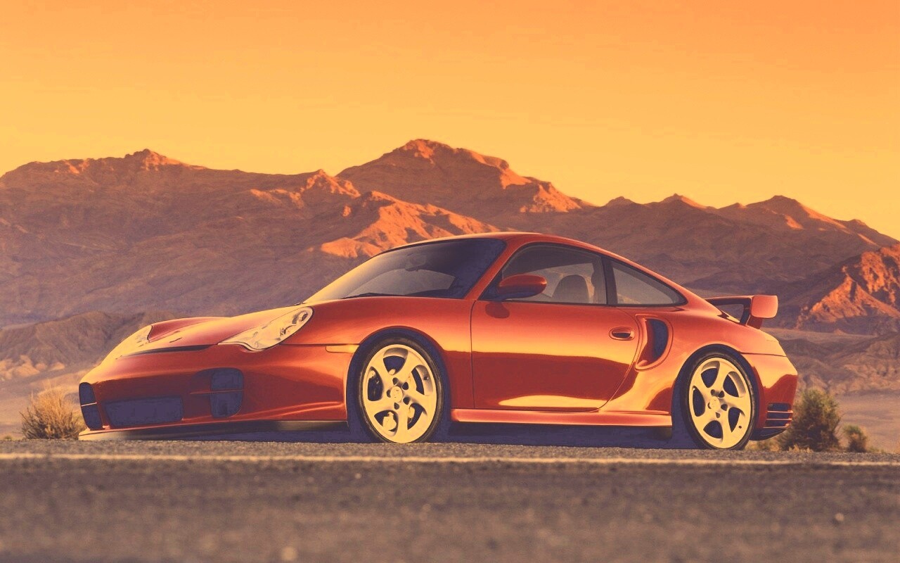 Красный Порше на фоне гор обои