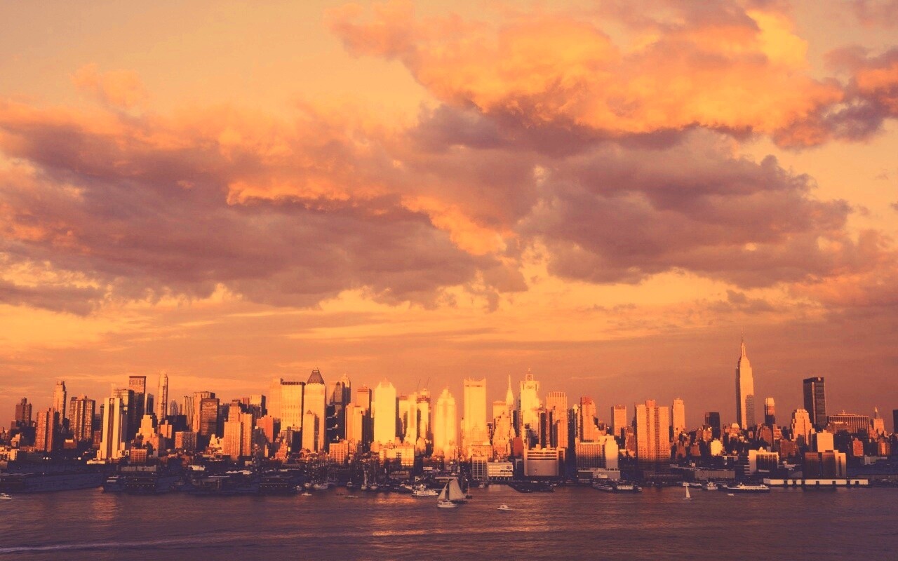 Панорама города на закате обои