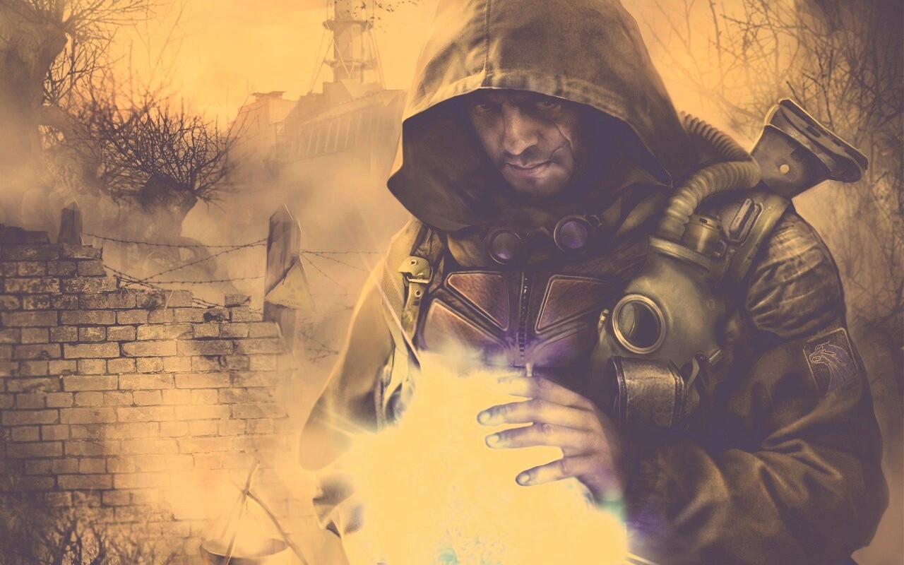 Сталкер с энергетическим артефактом в руках обои