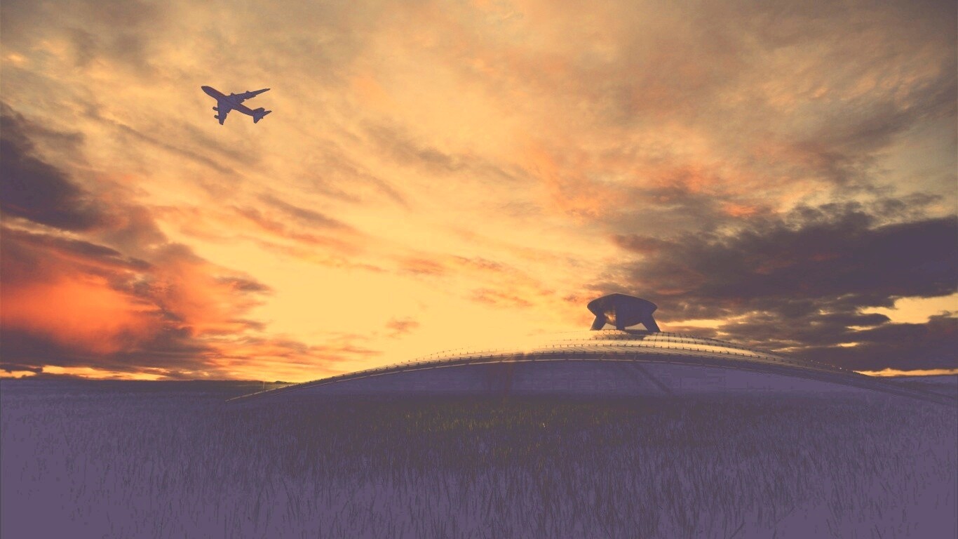 Самолет в закатном небе обои