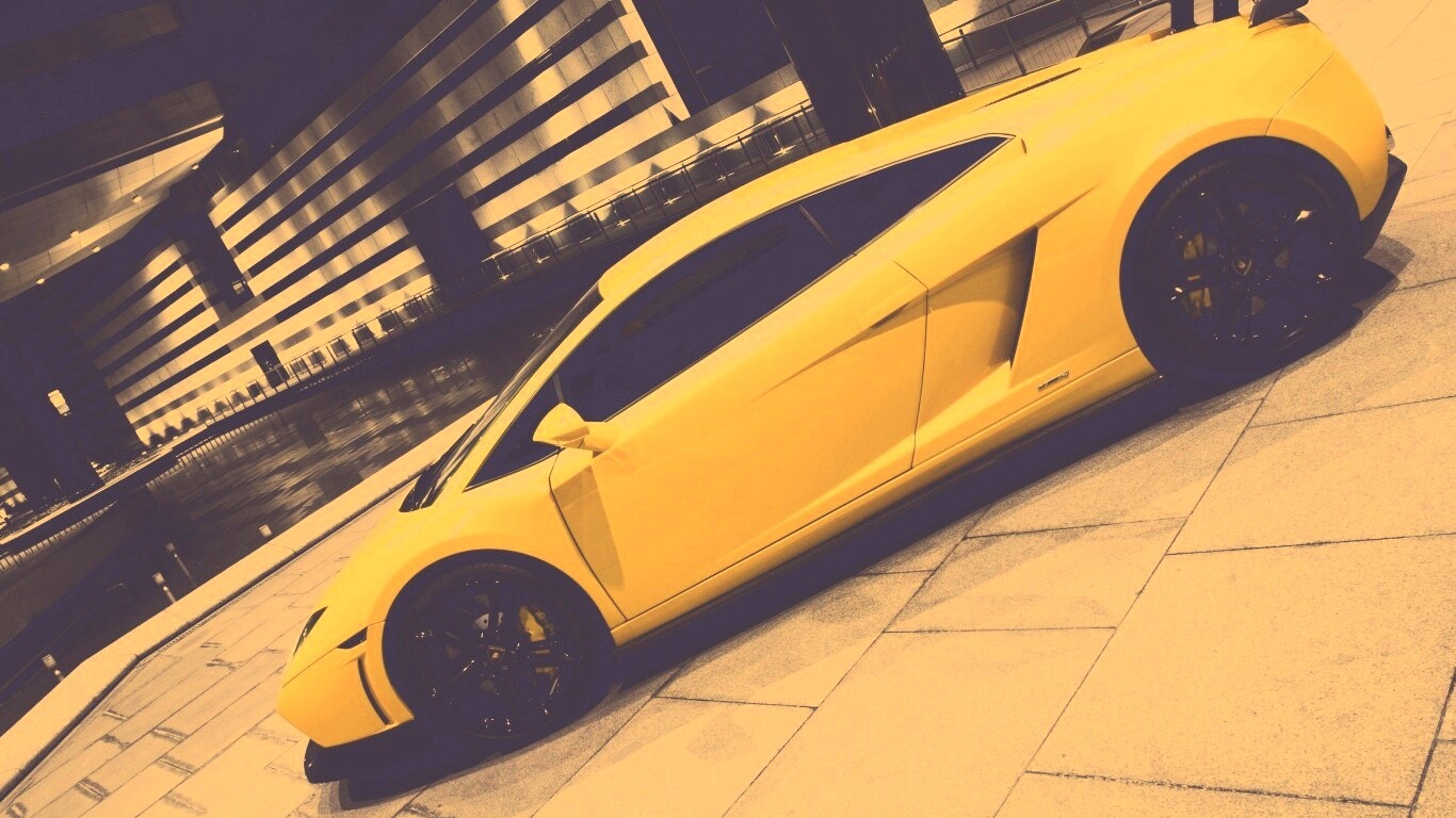 Желтая ламборджини в автосалоне обои