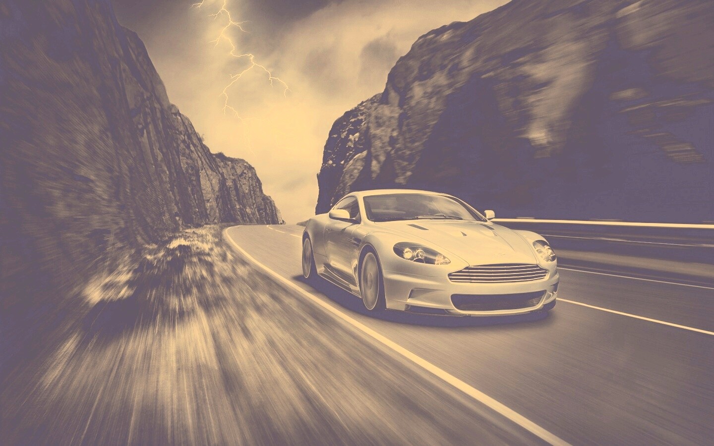 Астон мартин на горной дороге обои