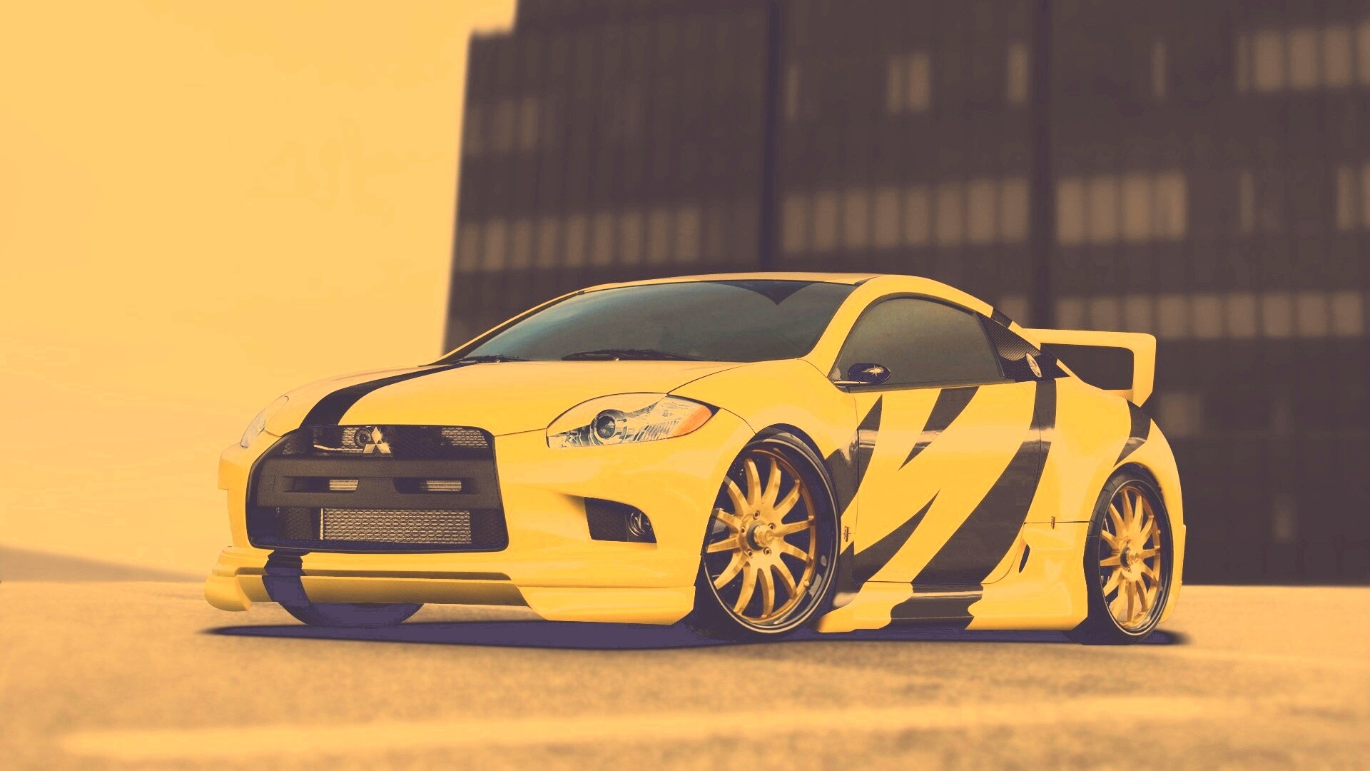 Mitsubishi жёлтого цвета с черными полосами обои