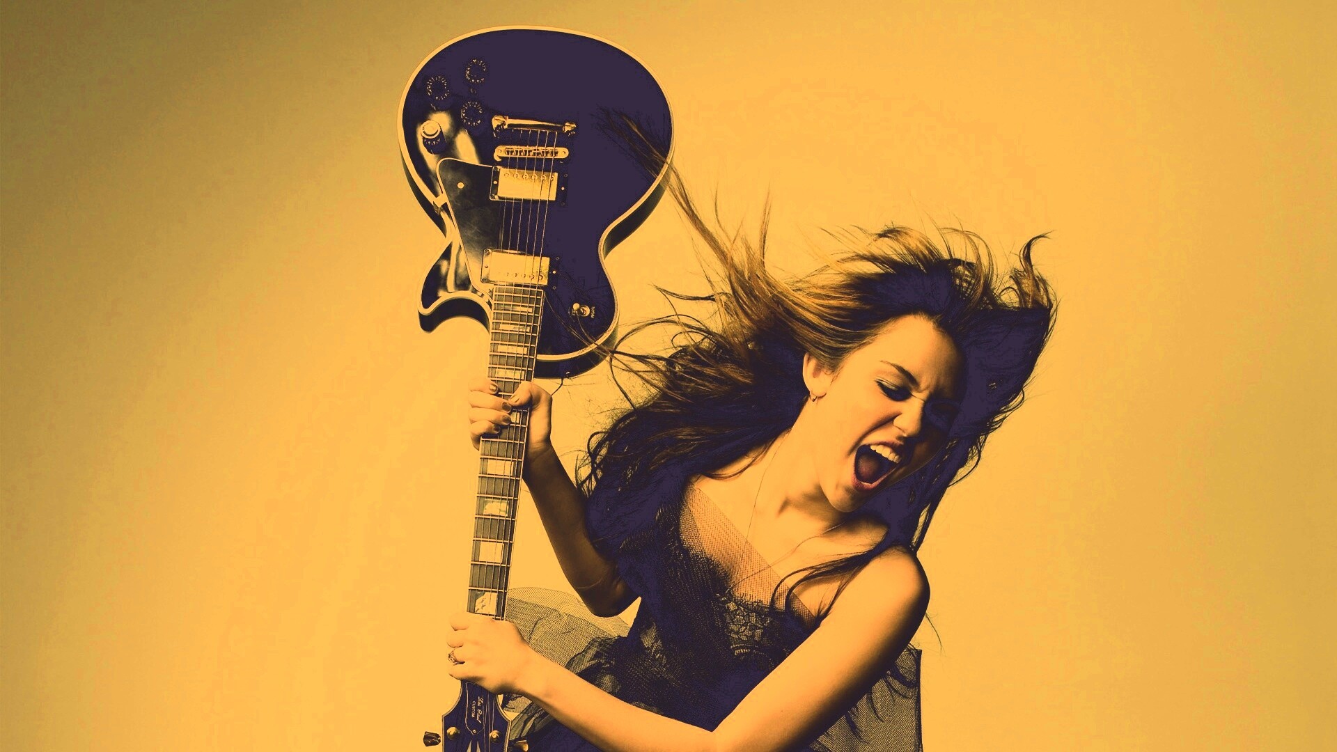 Miley Cyrus разбивает гитару обои