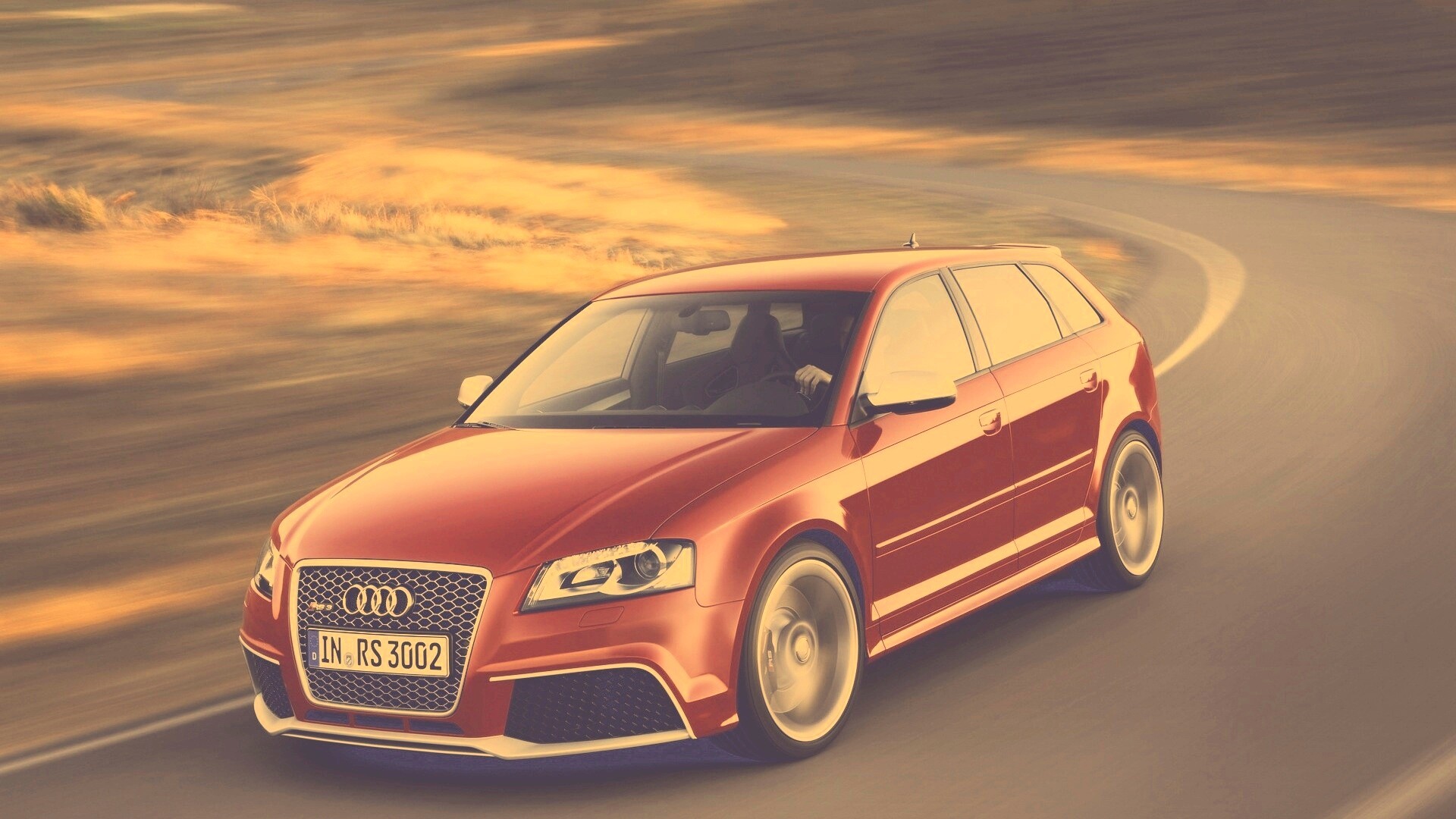 Красная ауди мчится по извилистой дороге обои