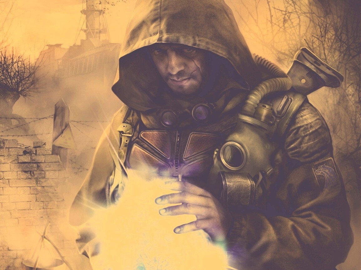 Сталкер с энергетическим артефактом в руках обои