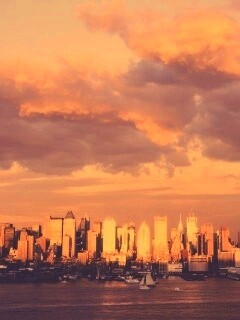 Панорама города на закате обои