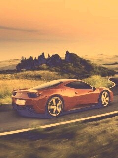 Красная феррари на извилистой дороге обои