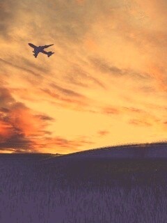 Самолет в закатном небе обои