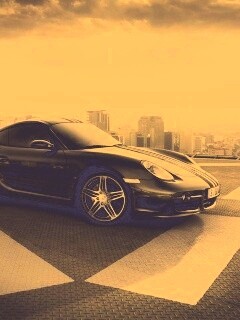 Порш на вертолетной площадке обои