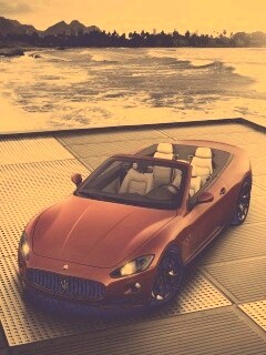 Мазерати на берегу моря обои