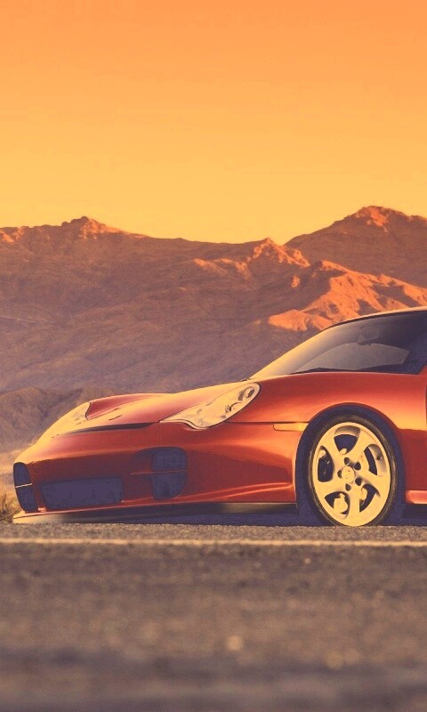 Красный Порше на фоне гор обои