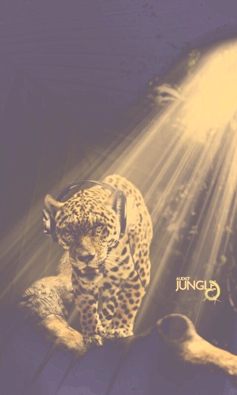 Ягуар в наушниках обои