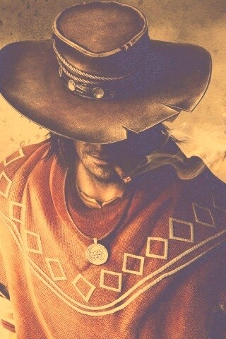 Мужик с сигарой в шляпе и пончо обои