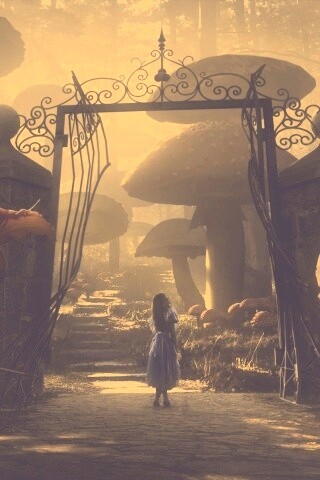 Алиса в стране чудес среди живых цветов обои