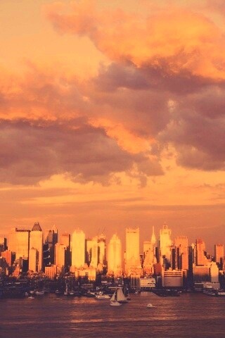 Панорама города на закате обои