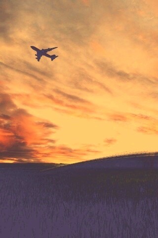 Самолет в закатном небе обои