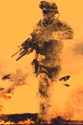 Солдат на фоне огня обои