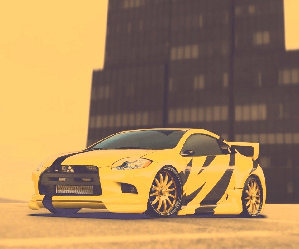 Mitsubishi жёлтого цвета с черными полосами обои