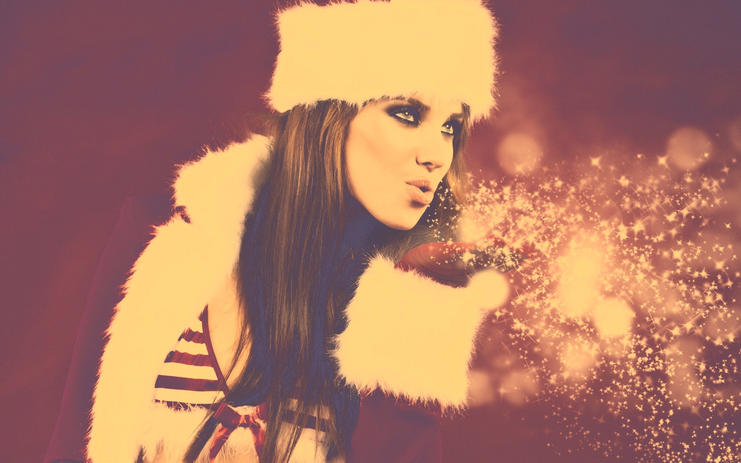 Снегурочка дует на снежинки обои