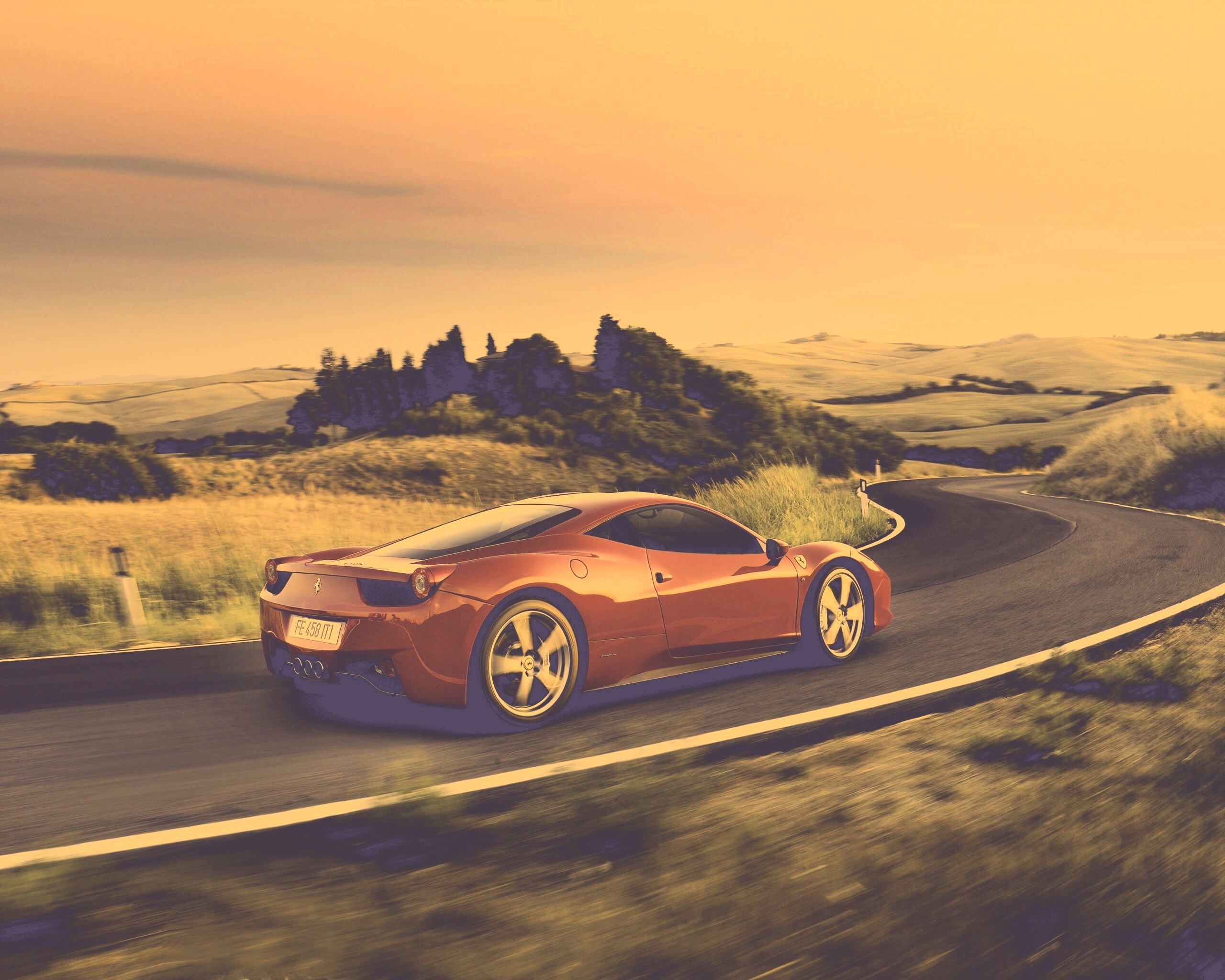 Красная феррари на извилистой дороге обои