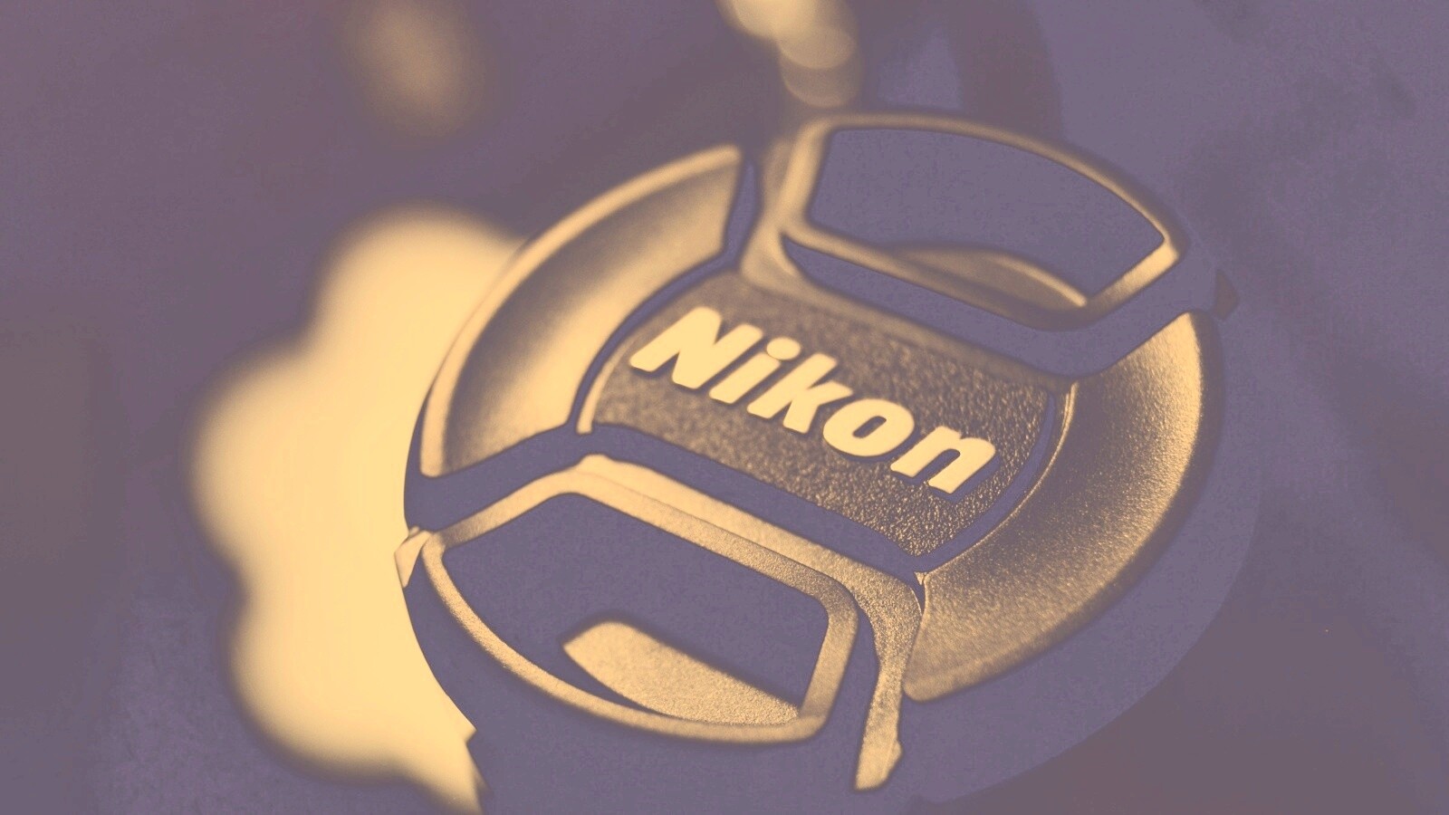 Крышечка от объектива Nikon обои