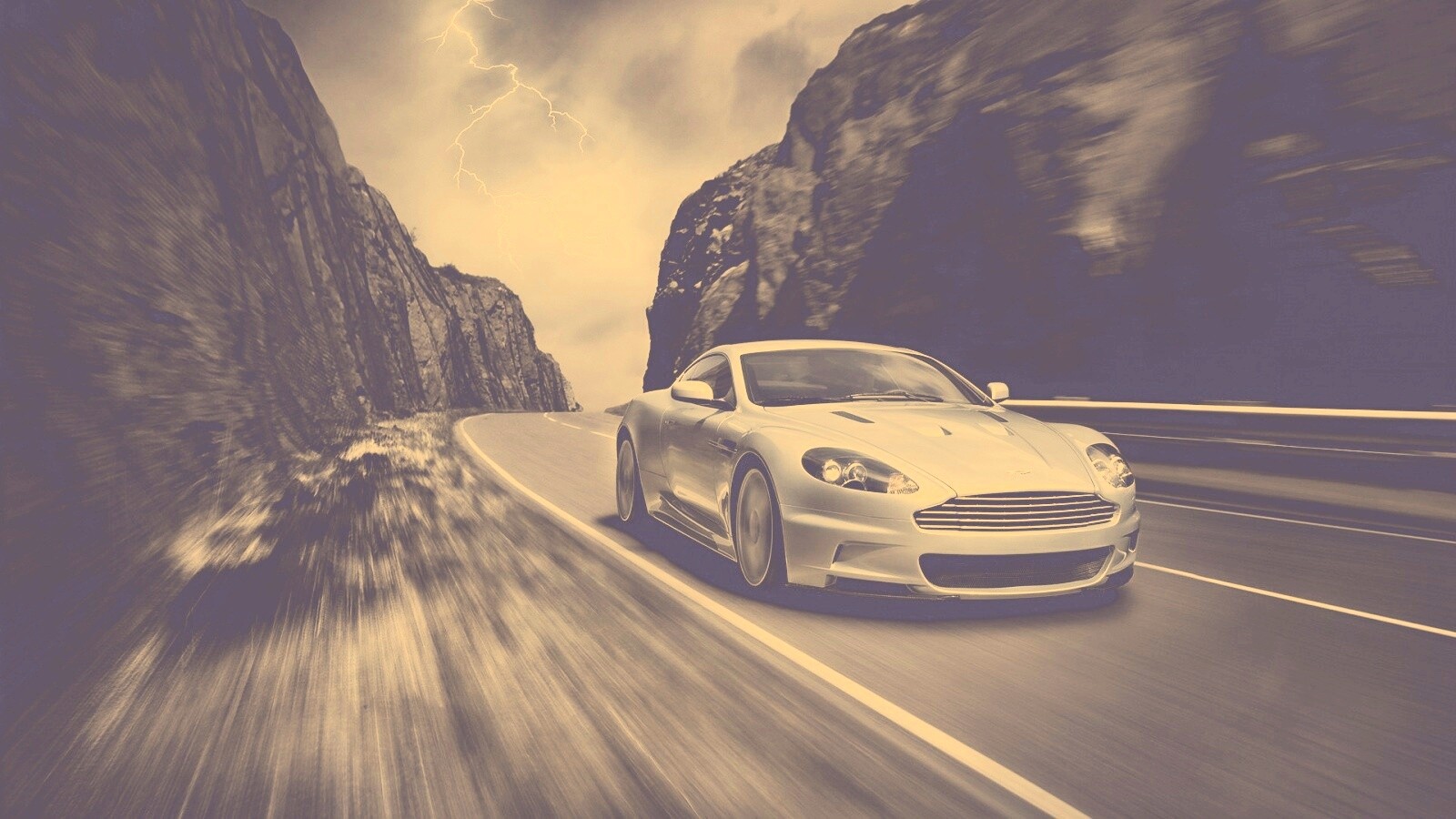 Астон мартин на горной дороге обои