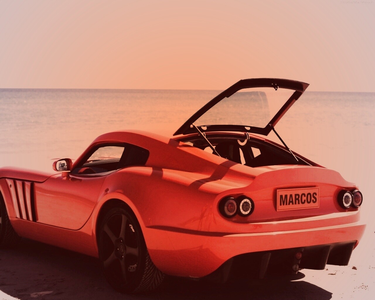 Marcos на пляже обои