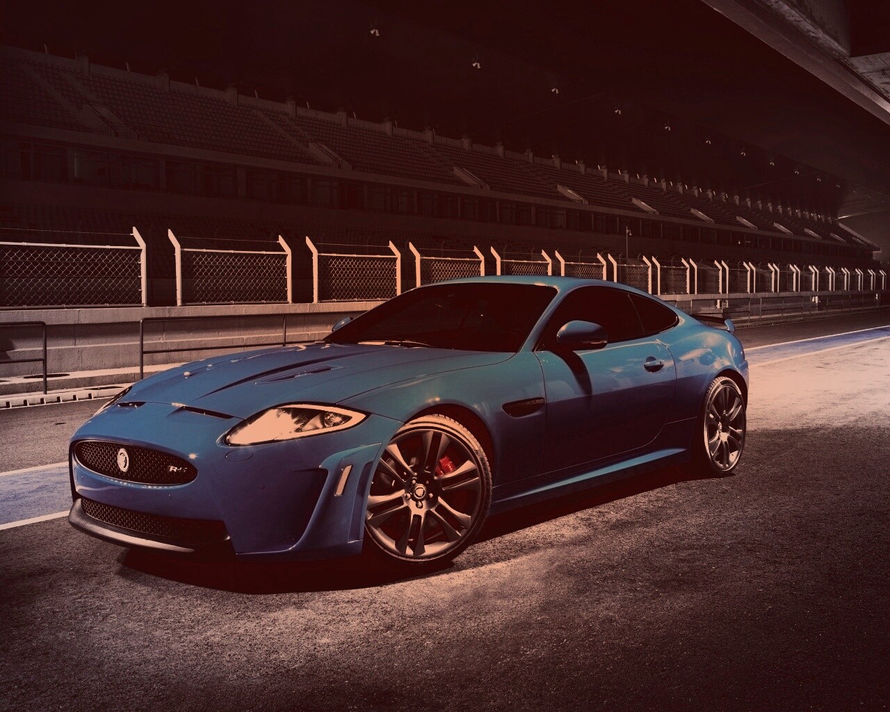 Синий спорткар на гоночном треке обои