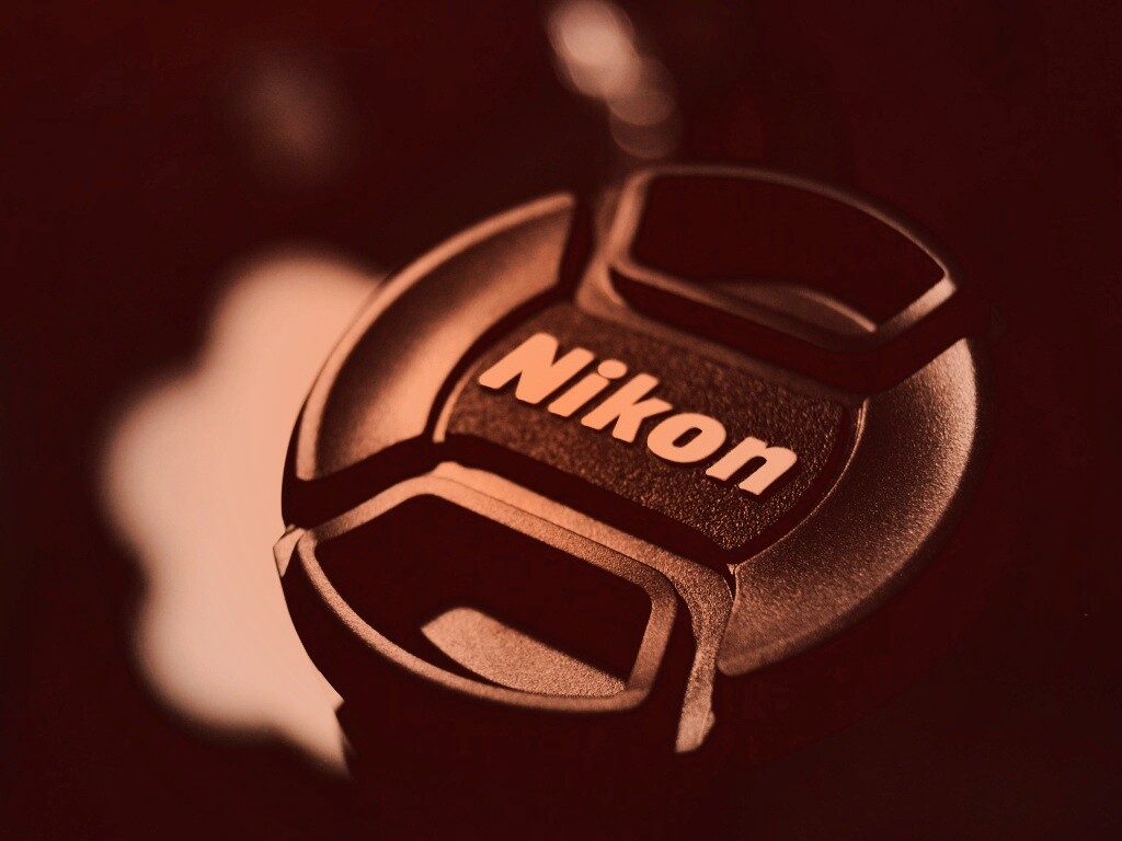 Крышечка от объектива Nikon обои