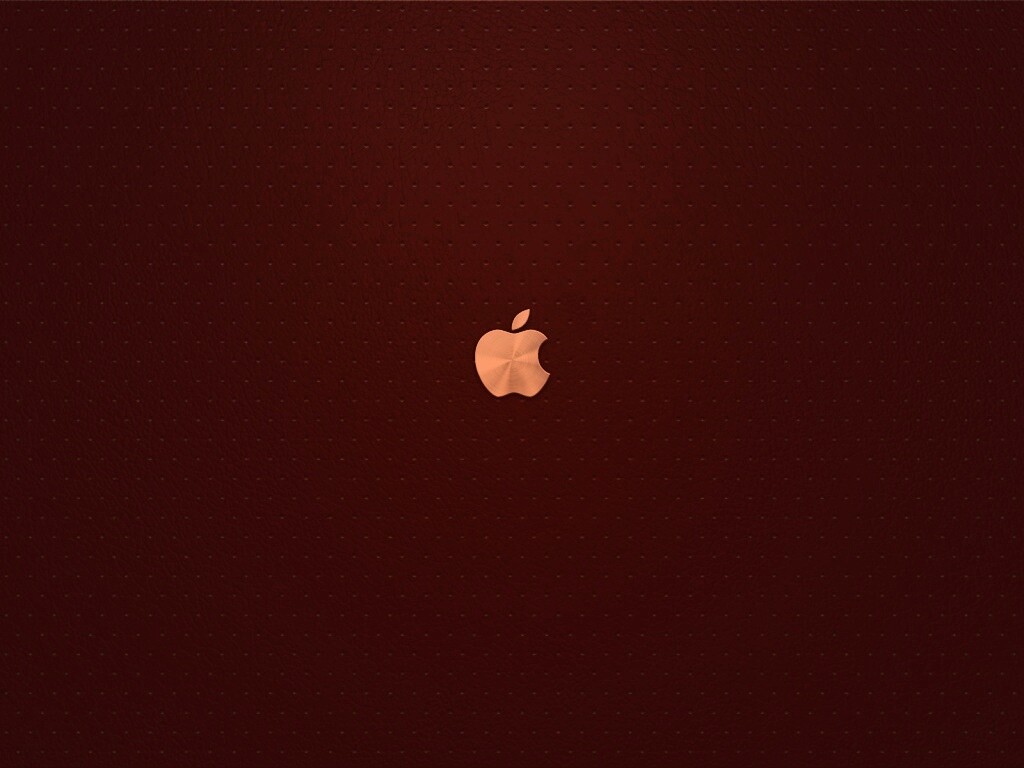 Маленький логотип Apple на перфорированной коже обои