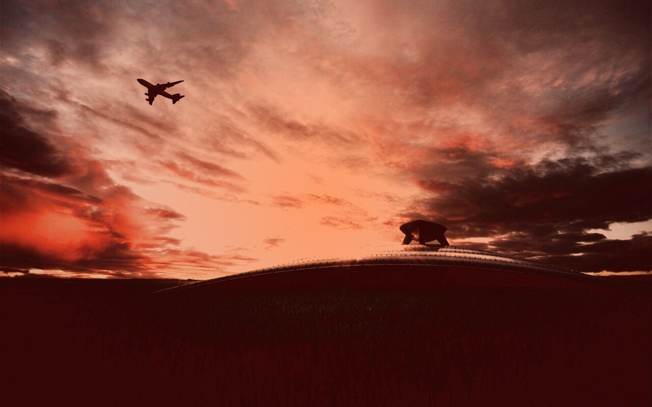 Самолет в закатном небе обои