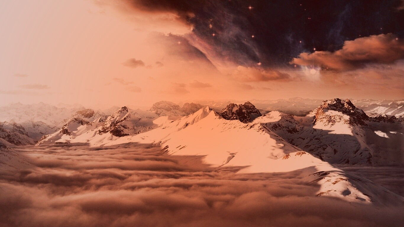 Горный хребет над облаками обои