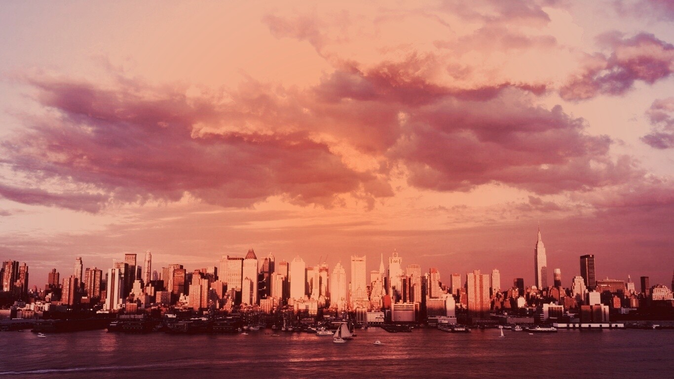 Панорама города на закате обои