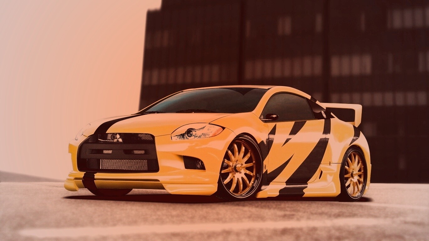 Mitsubishi жёлтого цвета с черными полосами обои