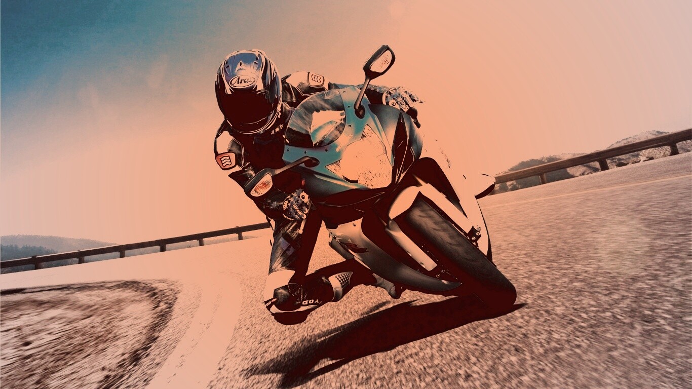 Мотоциклист на повороте обои