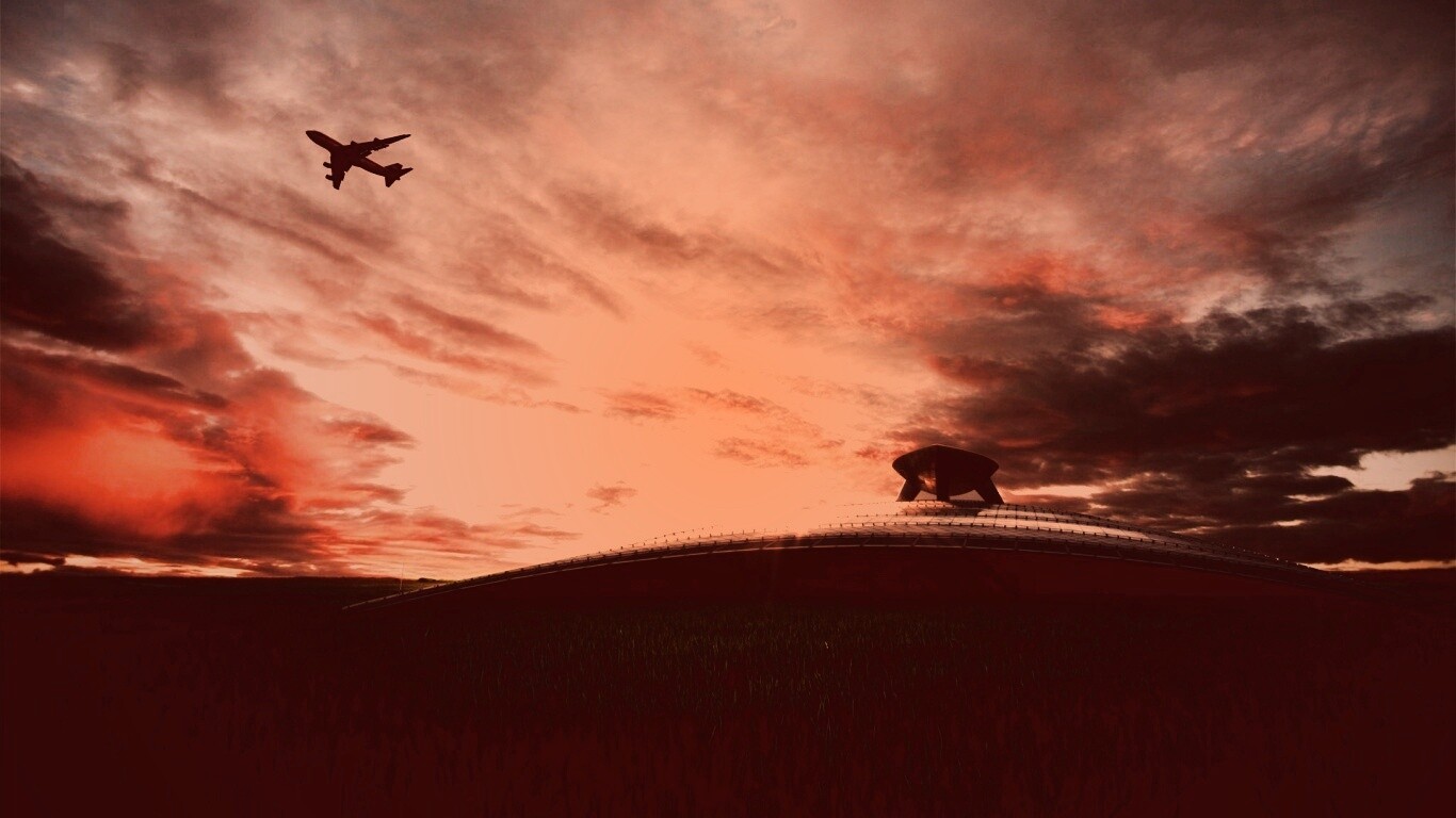 Самолет в закатном небе обои