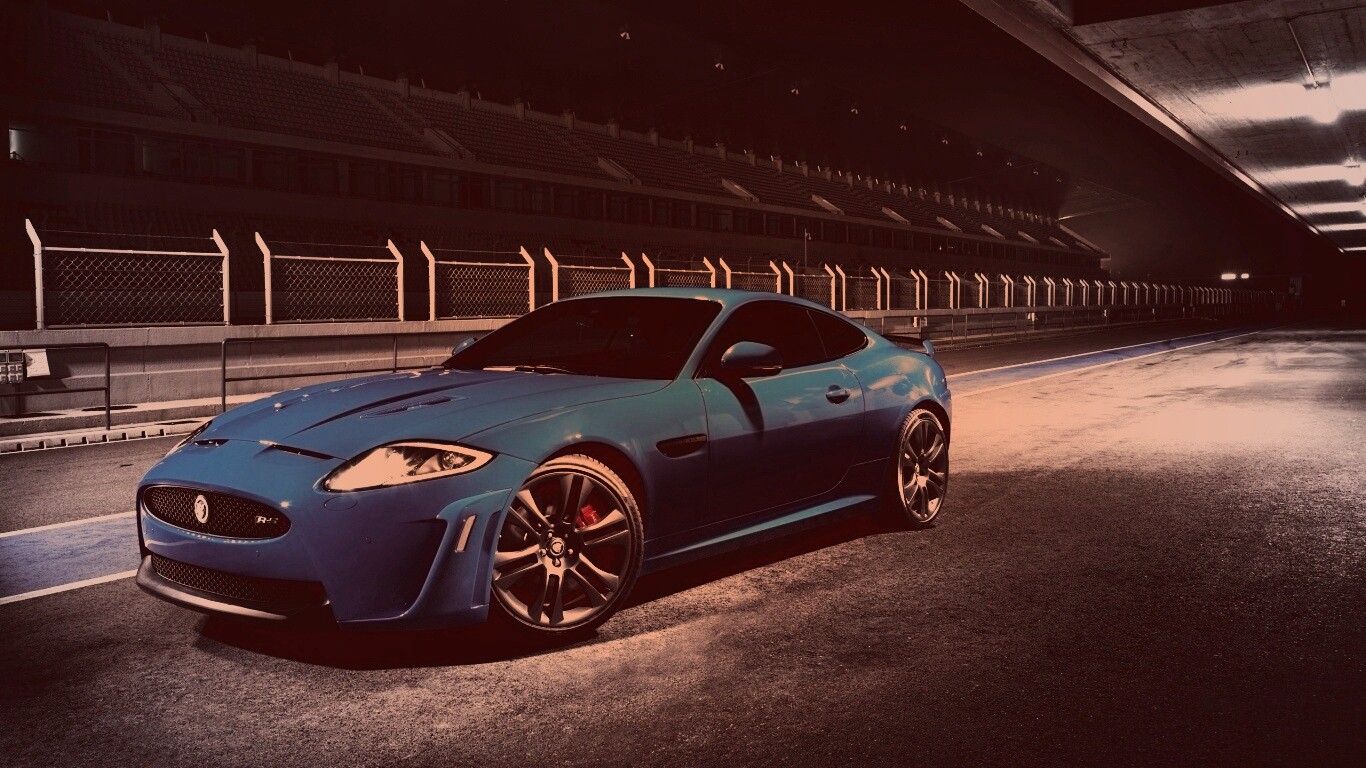 Синий спорткар на гоночном треке обои