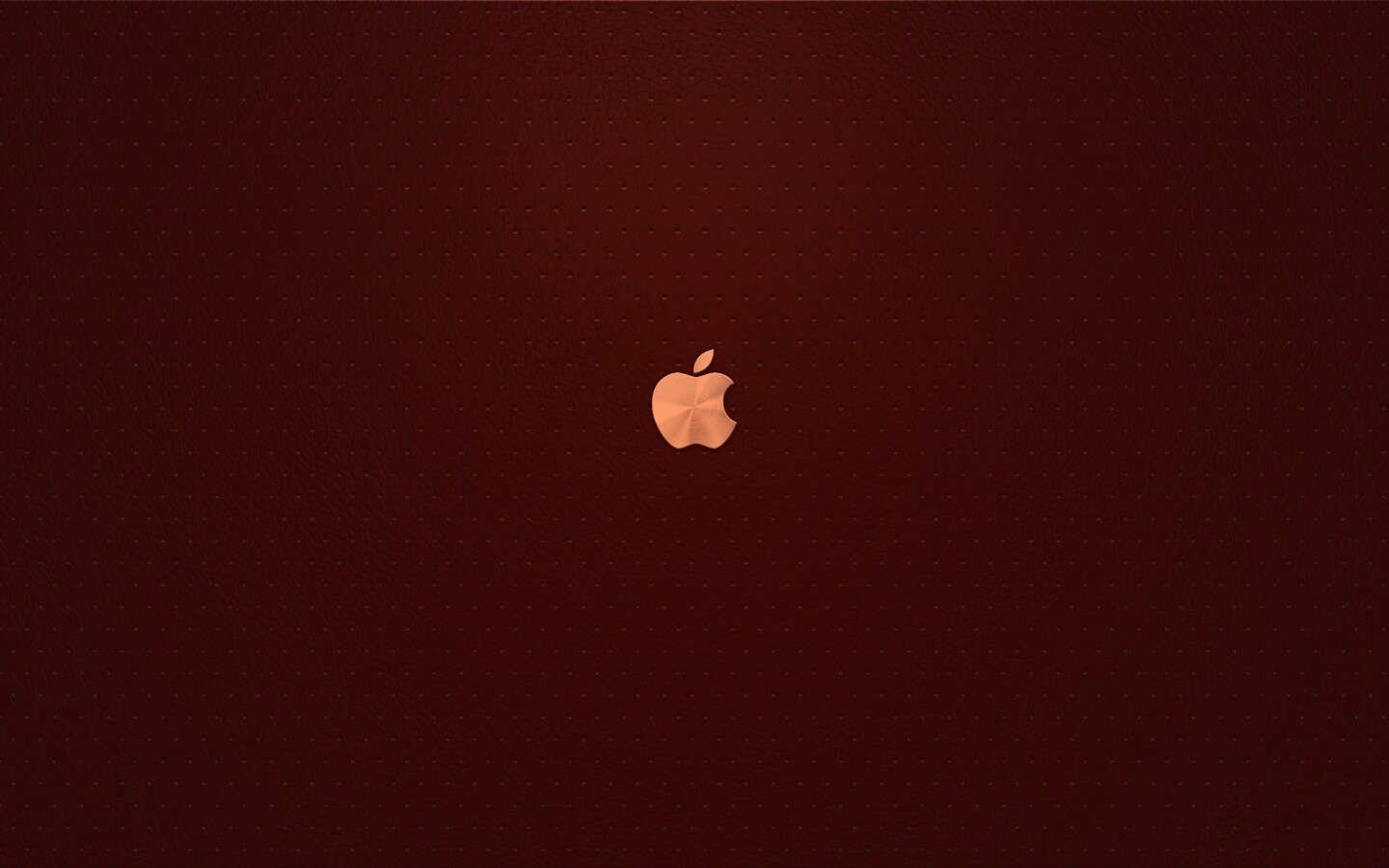 Маленький логотип Apple на перфорированной коже обои