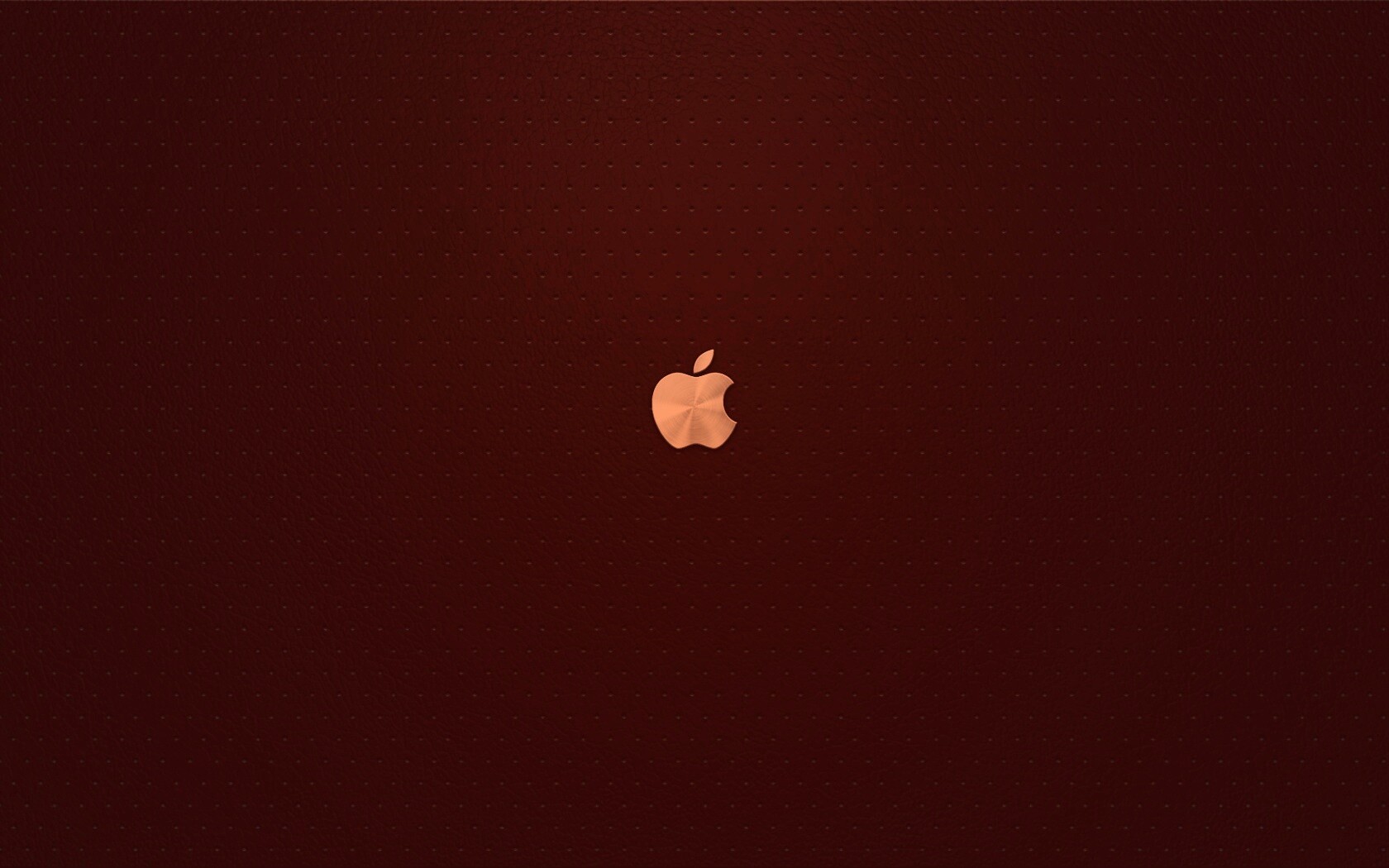 Маленький логотип Apple на перфорированной коже обои