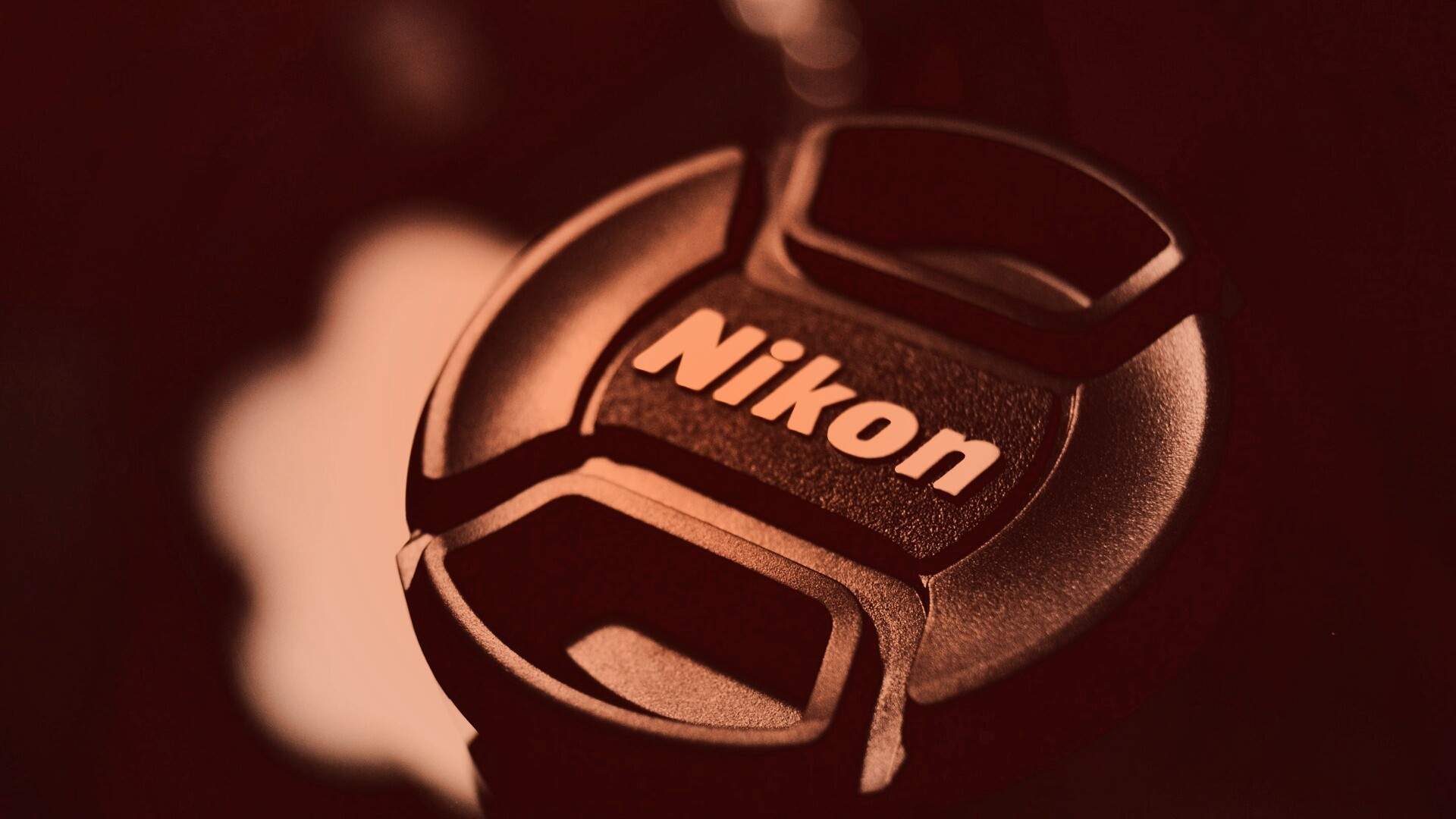 Крышечка от объектива Nikon обои