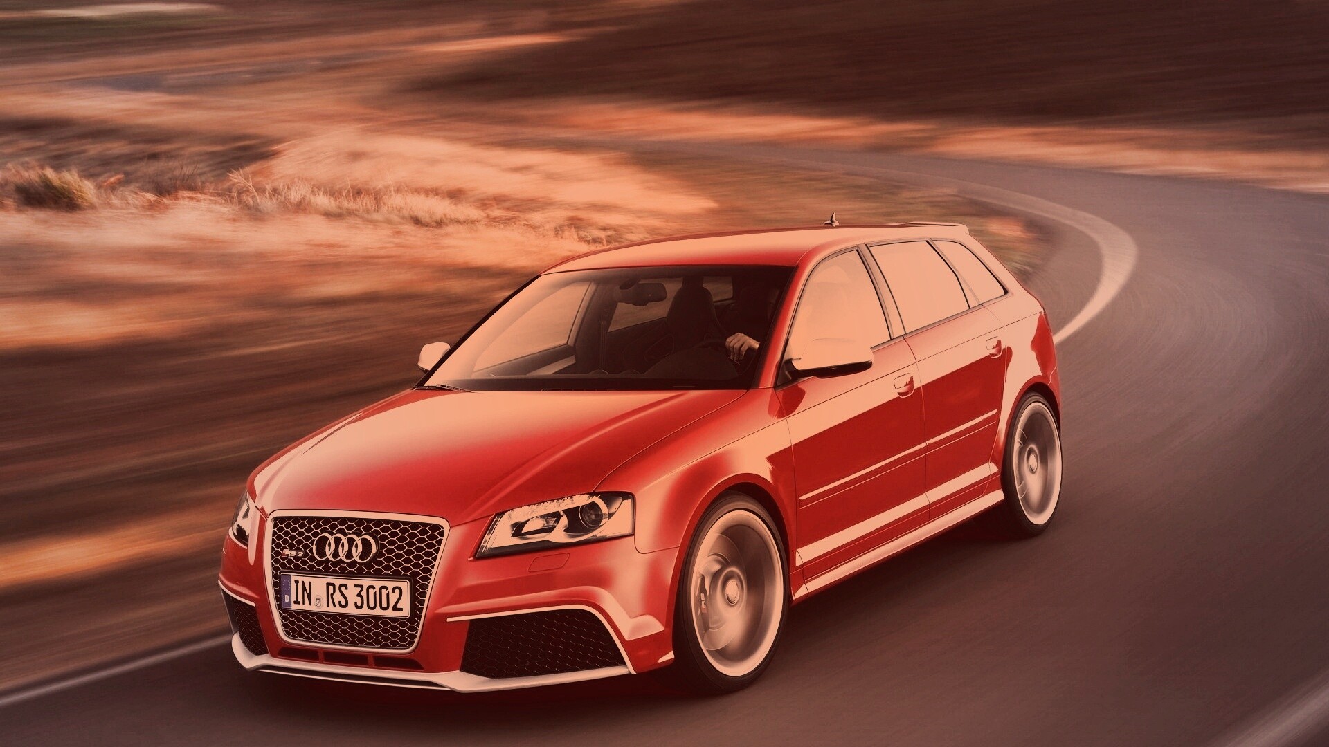 Красная ауди мчится по извилистой дороге обои