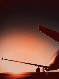 Самолет на закате обои