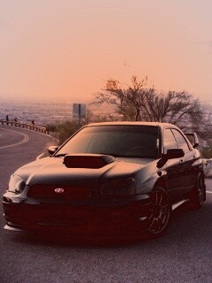 Субару на смотровой алощадке в горах обои