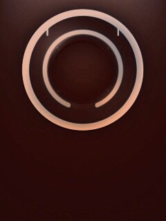 Диск из Tron на черном фоне обои