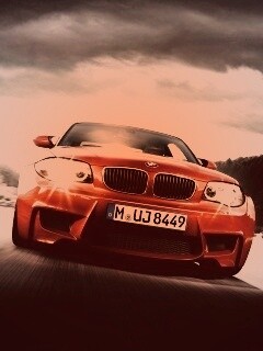 Оранжевый BMW M1 Coupe на треке обои