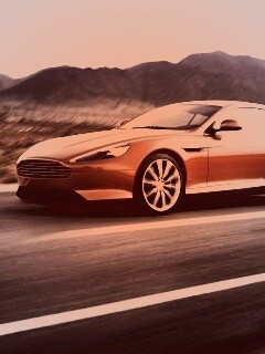Астон Мартин на шоссе обои